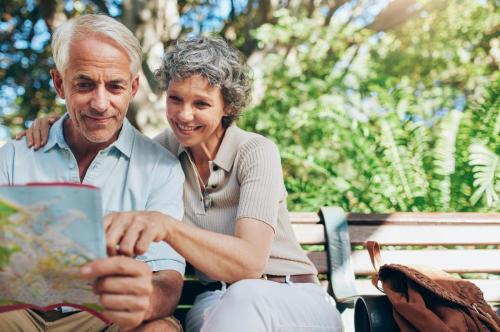 A couple on vacation thanks to the proceeds they received from a reverse mortgage loan.